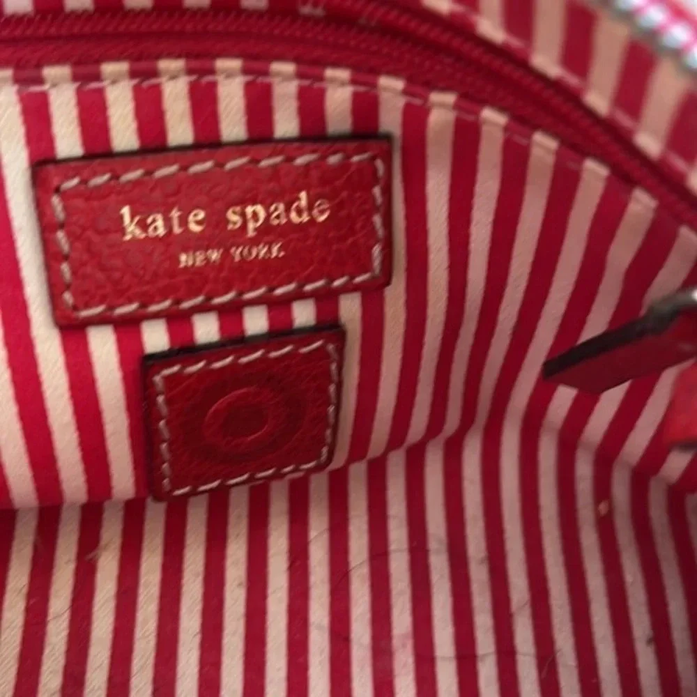 Kate Spade red pebbled leather wristlet bag